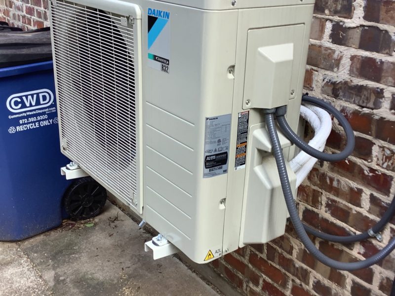 Part of a mini ductless split system installed at a house.