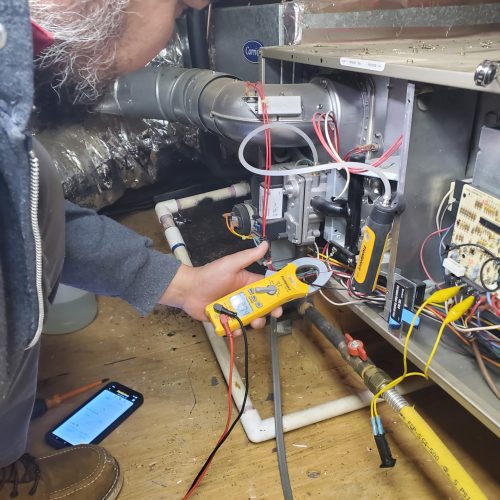 examining readings on AC unit